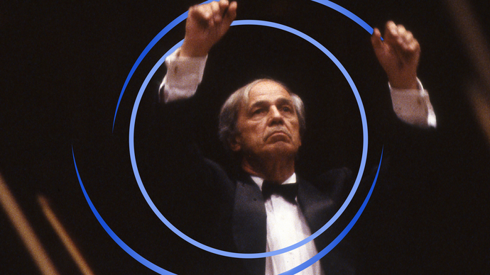 Pierre Boulez conducting, with blue circular swirls around him