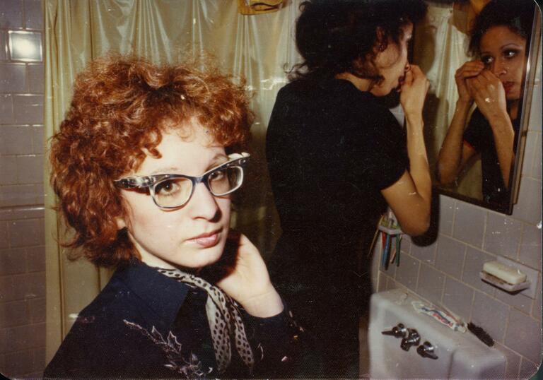 Nan Goldin stars at the viewer