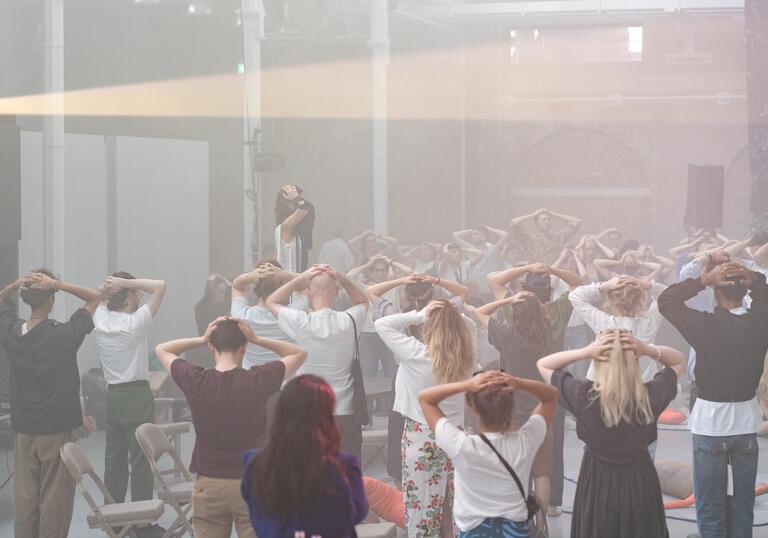 Participants in a somatic movement workshop