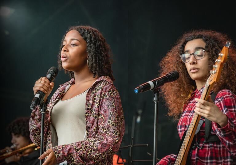 Music Education Islington performance - young singer and guitar player