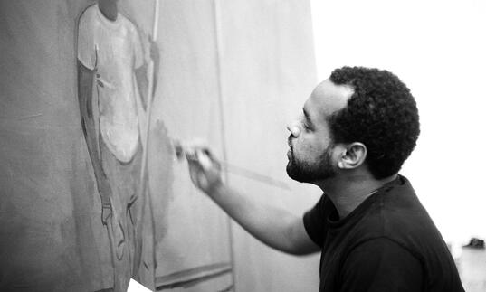 Noah Davis at work, Los Angeles, 2009, Photo by Patrick O'Brien-Smith