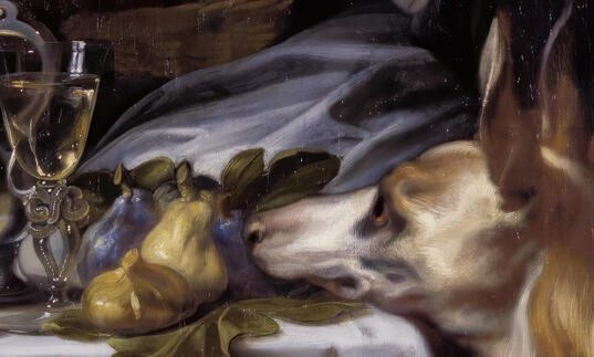 A still life of pears and a dog onlooking