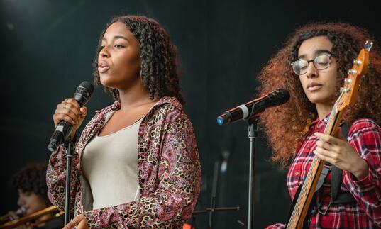 Music Education Islington performance - young singer and guitar player
